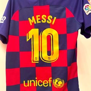 Messi jersey. European size 22. Fits kids 6-7 years old. Great condition.